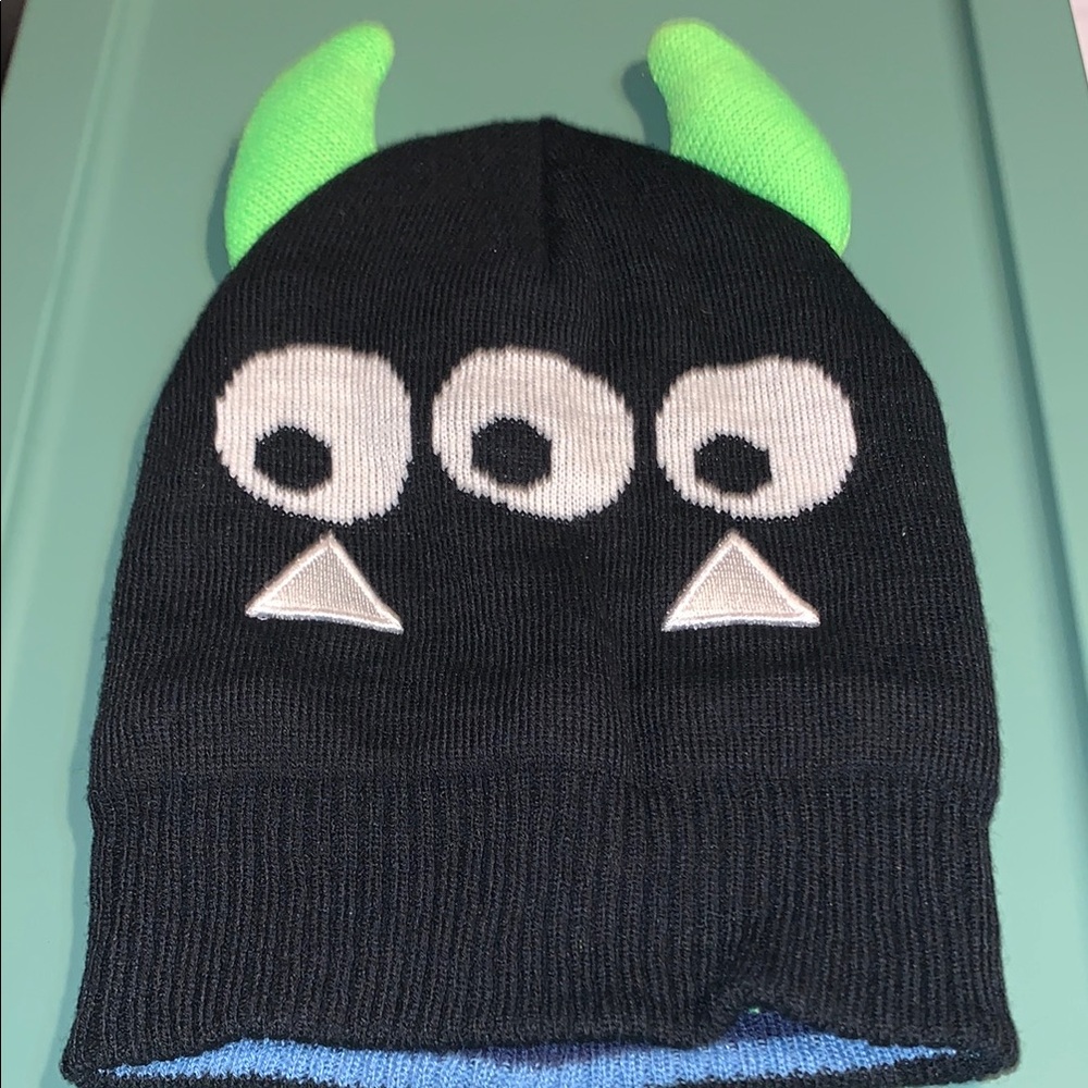 Whimsical Black and Green Knit Beanie with Neon Horns